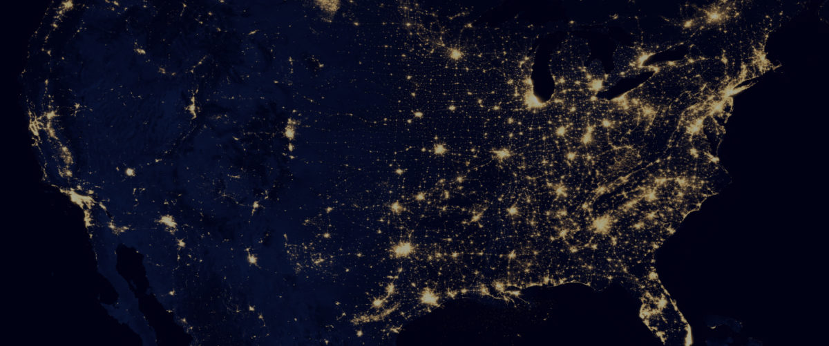 A map of the United States lit up at night.