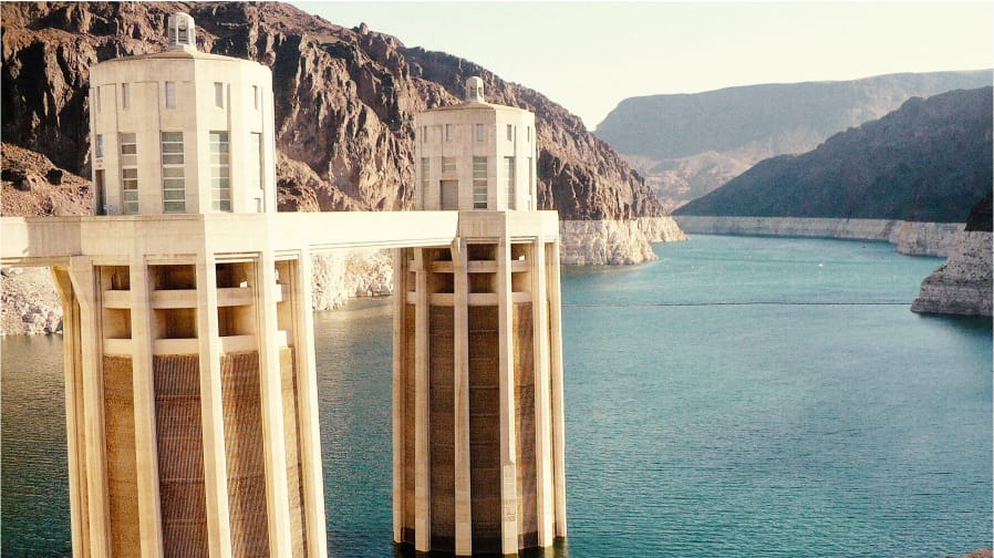 A color photo of Hoover Dam and Lake Mead. Big Ag is Draining the Colorado River Dry