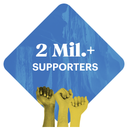 An icon reading "2 Mil.+ supporters" with three fists raised underneath.