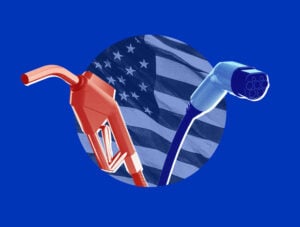 A gas nozzle and an EV charger in front of an American flag.