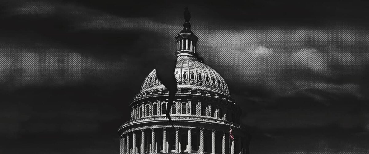 U.S. Capitol Building under ominous dark skies with a large visible crack running through the structure.