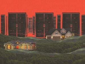 Data center servers loom over a pair of houses.